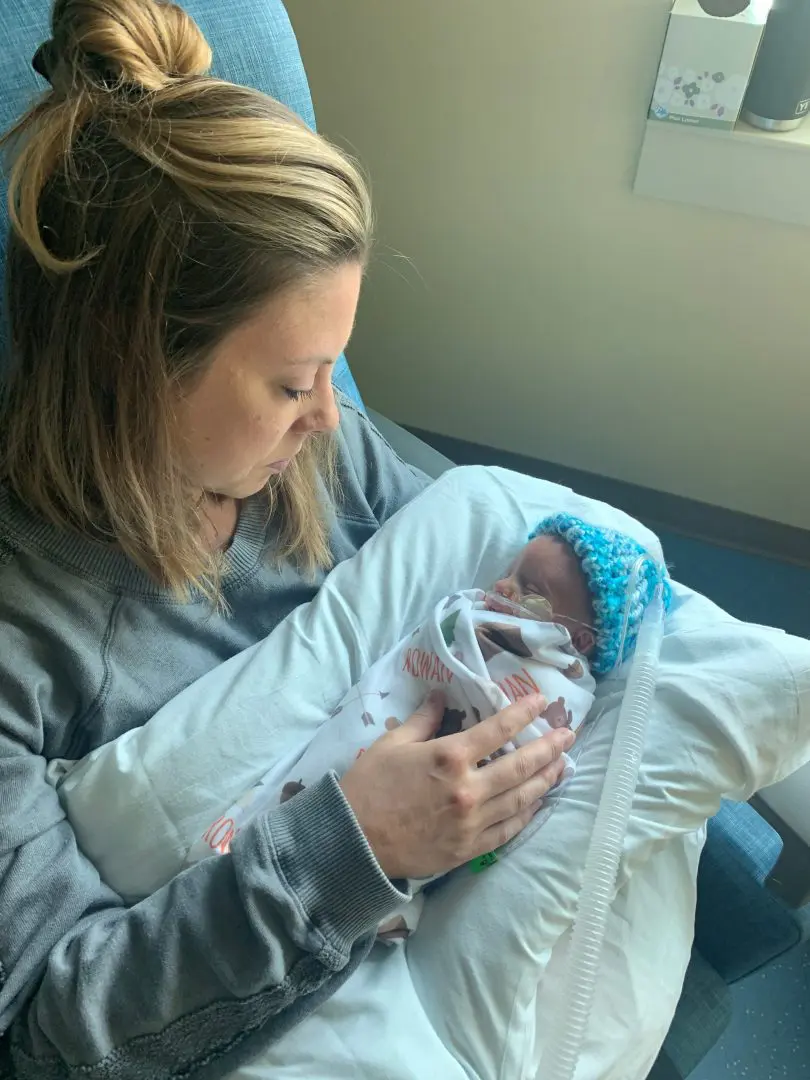 Shelley Endsley holding Rowan in the NICU